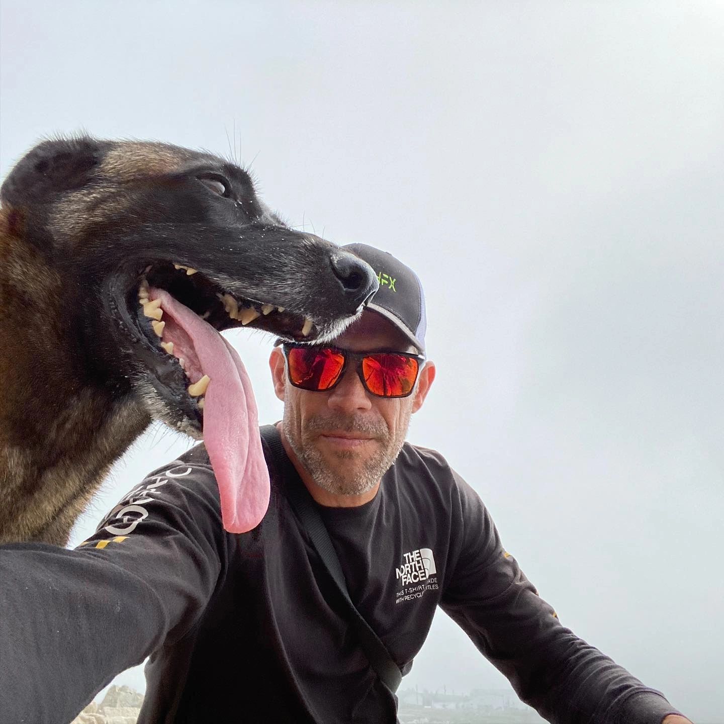 4PAWSHFX owner with dog outdoors